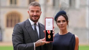 David Beckham received which specific title as part of his knighthood? a) Knight Commander of the British Empire (KBE) b) Knight Bachelor c) Knight of St Michael and St George (KCMG) d) Companion of Honour