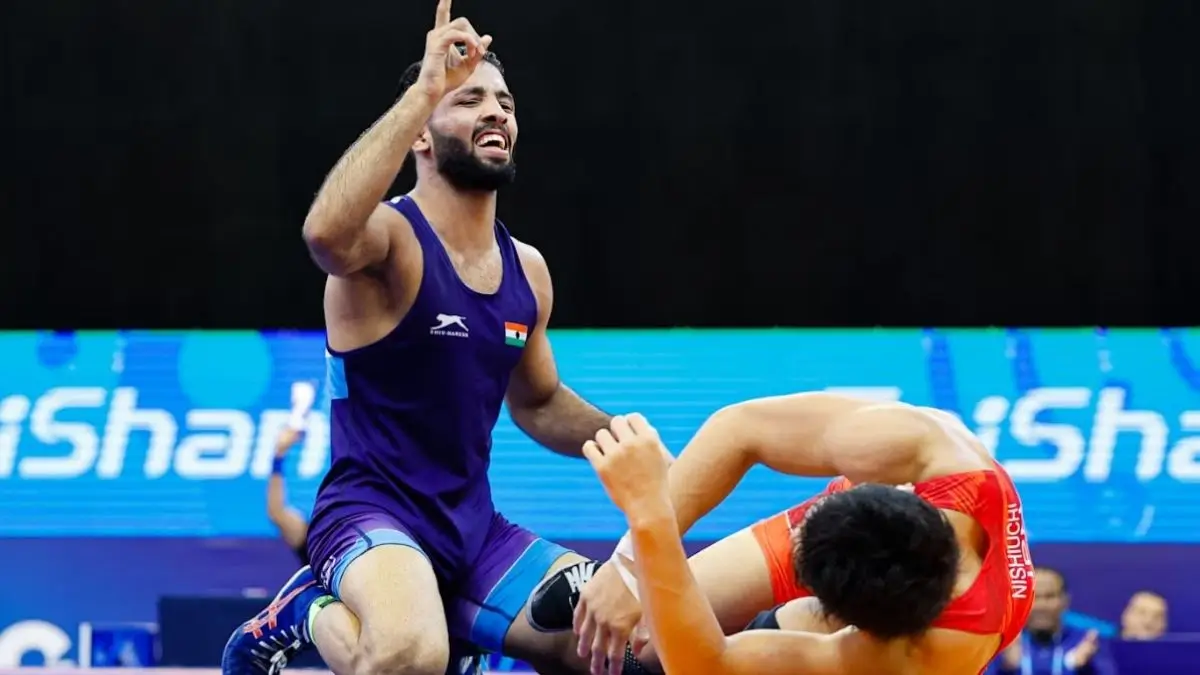 Indian wrestlers have delivered the strong performance at the Asian Wrestling Championships 2026. As the Sujeet Kalkal and Abhimanyou Mandwal won the gold medals in the freestyle categories. The tournament held in Bishkek and Indian wrestlers have showed the shear dominance and resilience on the pitch. After this winning medal tally of the Indian have surged. Sujeet Kalkal Wins Gold in 65kg Category Sujeet Kalkal had delivered the commanding performance in the 65kg freestyle final and he defeated the Uzbekistan'z Umidjon Jalolov with the decisive 8-1 victory. Key Highlights of His Victory He is the first Indian to win 65kg gold since the Bajrang Punia in 2019. He also secured his third consecutive gold medal in this year. Also displayed dominance with the strong offensive and defensive tactics Abhimanyou Mandwal's Gold in 70kg Abhimanyou Mandwal clinched gold in the 70kg freestyle category with another remarkable performance  and he defeated the Mongolia's Olympian Tomor Ochiryn Tulga with the score by 5-3. Key Highlights of His Victory He have defeated an Olympian opponent.. Showcased the exceptional with the tactical awareness. He also marked a breakthrough moment in his international career. India's Medal Tally and Overall Performance After this wins India's performance at the tournament has been impressive. Total medals: 14 Gold: 2 Silver: 4 Bronze